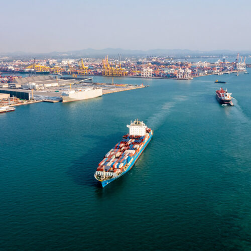 cargo ships leaving port