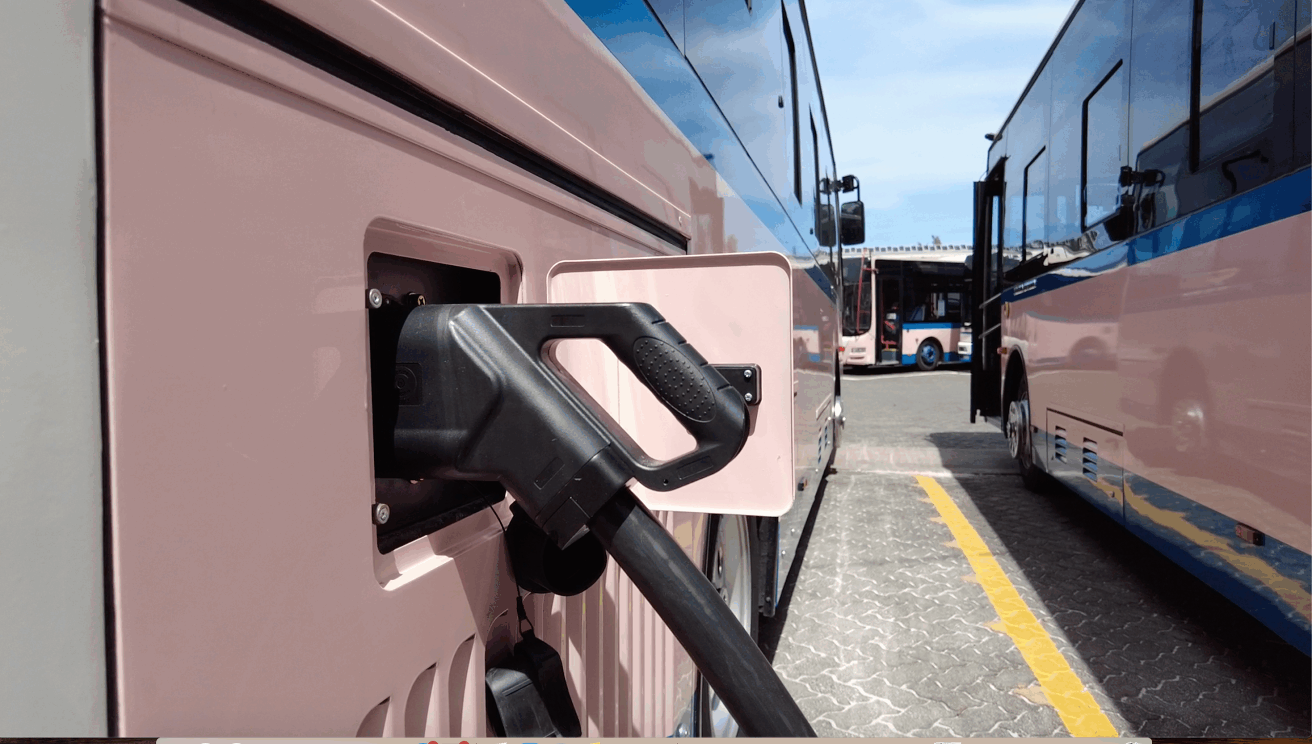 one of the new EV buses charging