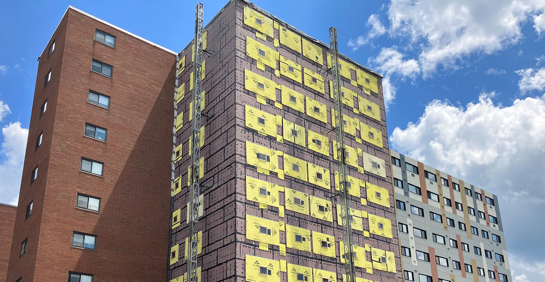 Transforming Existing Buildings from Climate Liabilities to Climate Assets