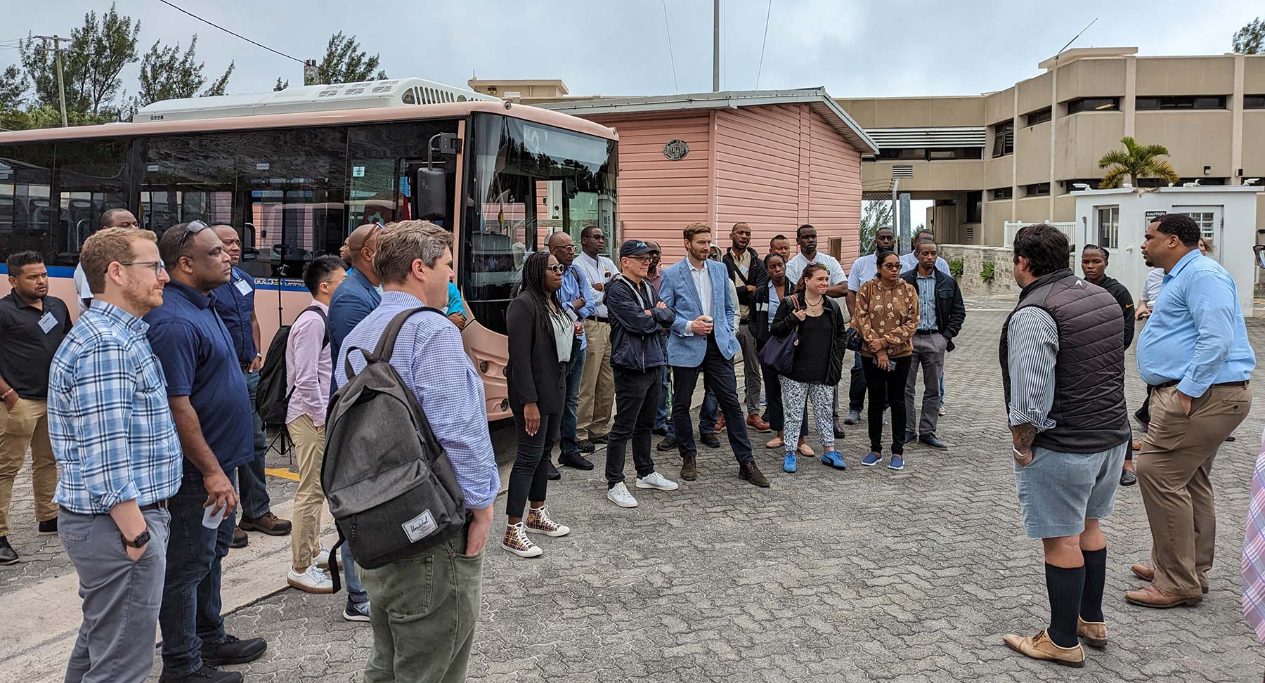Bermuda Summit bus gathering of attendees