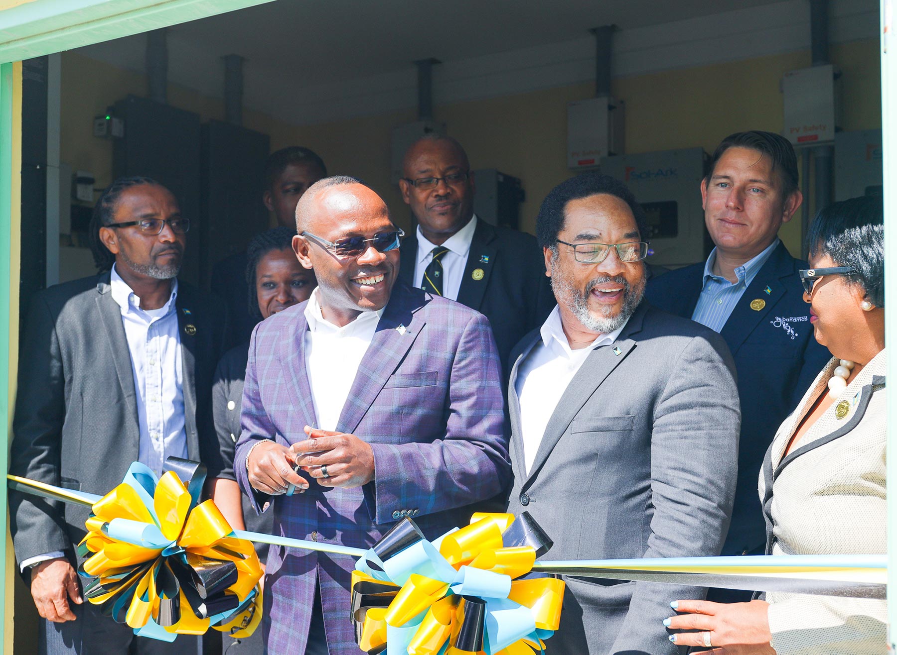 Bahamian Deputy Prime Minister, Hon. I. Chester Cooper, alongside government officials, RMI and project partners, before cutting the ribbon to celebrate the new systems across Abaco primary schools. Photo credit Compass Solar