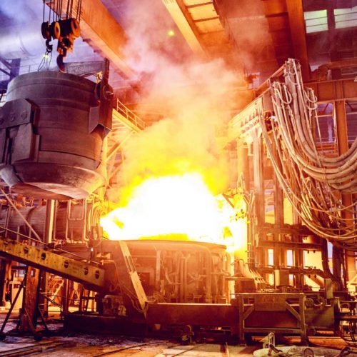 Steel, Factory, Business, Industry, Africa - Scrap metal being poured into an Electric Arc Furnace