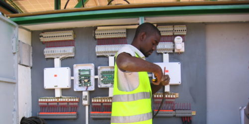 electrician working on electrical panels