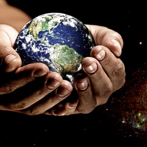 earth in palm of hands