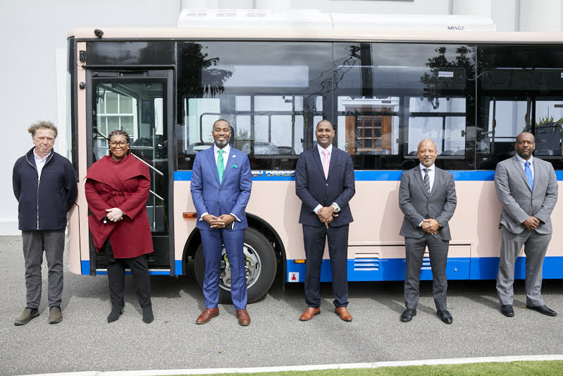 Bermuda officials accepting the delivery of new EV buses