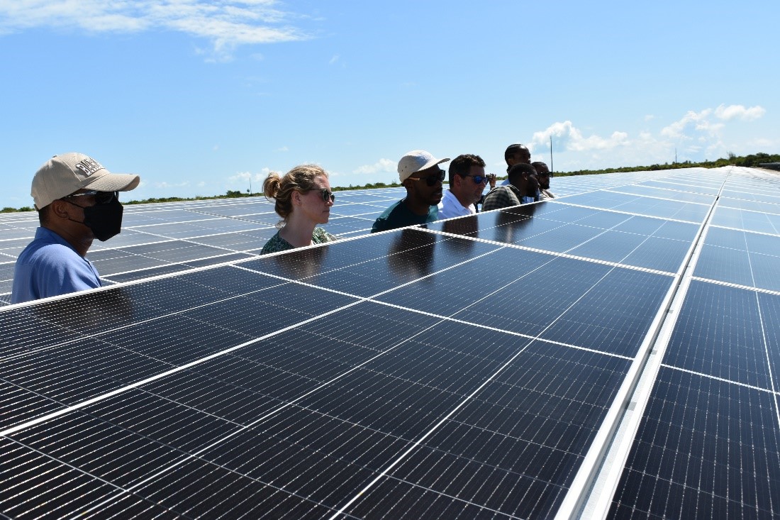 From left to right: RMI Global South Project Manager Fidel Neverson with RMI Islands Team and ETA Fellows at the Chub Cay solar microgrid in The Bahamas, during the Inaugural Caribbean Fellows’ Summit