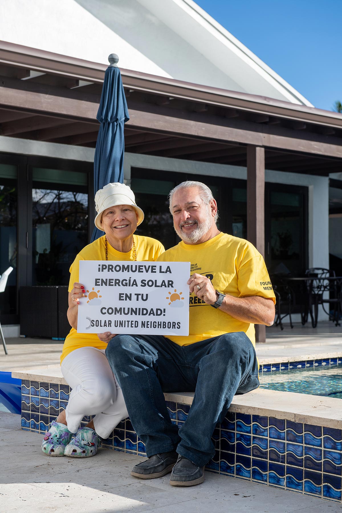 Vicky and Richard Delgado displaying their excitement for their new solar system in Hialeah, Florida Photo courtesy Sun United Neighbors