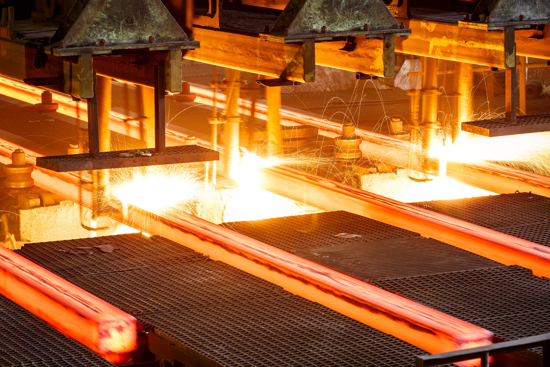 hot steel on conveyor Close shot in steel mill