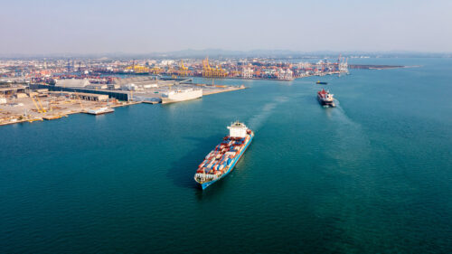 cargo ships leaving port