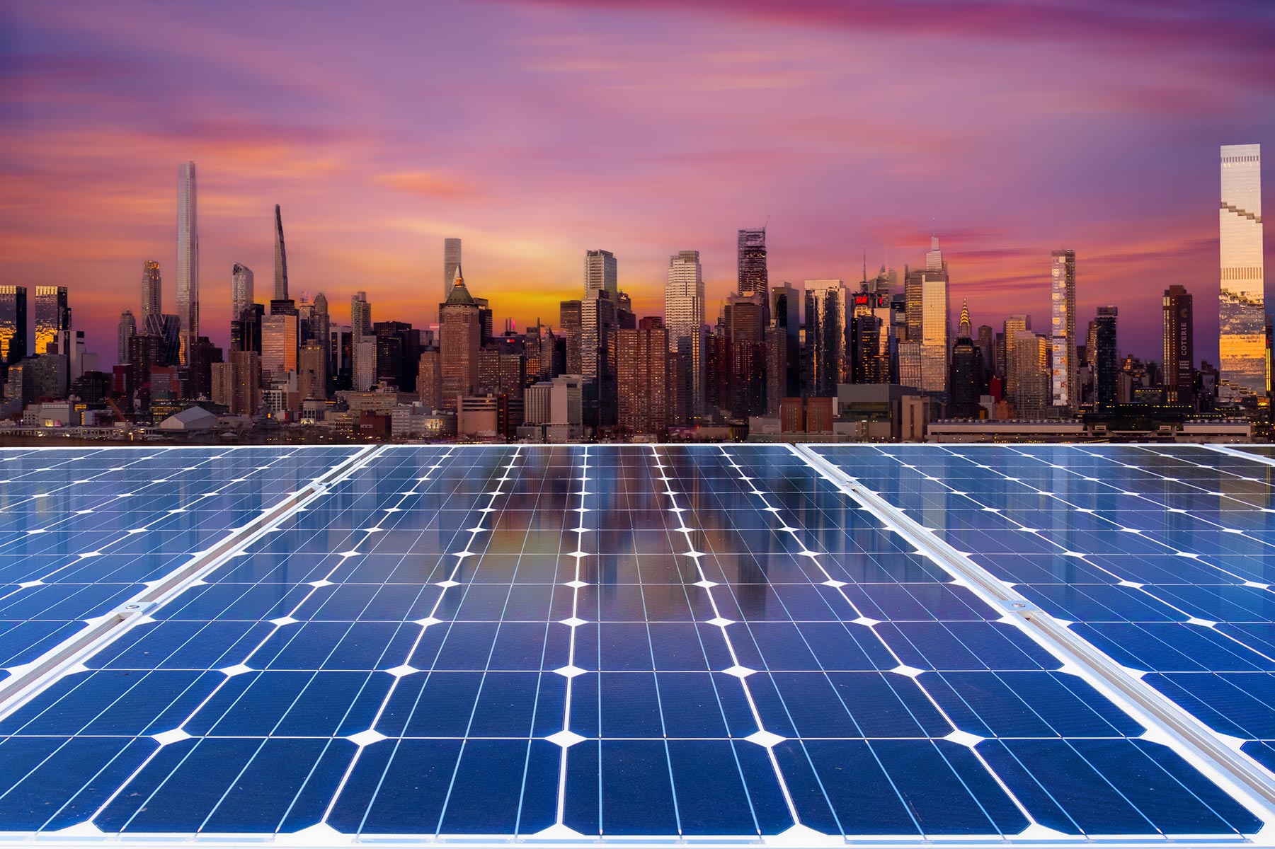 city skyline with solar panels in foreground