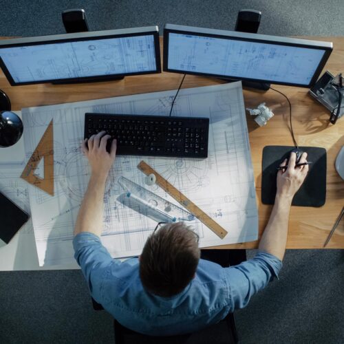 above view of a man working at his desk