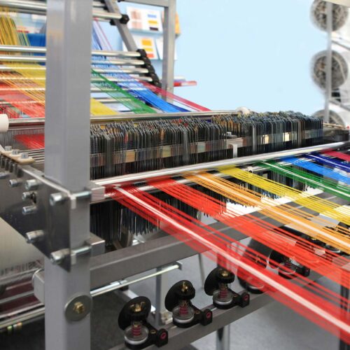 multi-colored yarn threads spun from machine