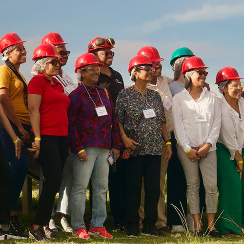 WIRE group standing in front of solar field