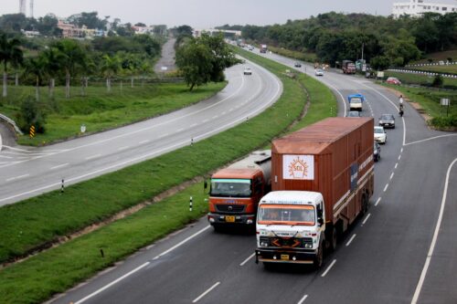 trucks on the highway in India