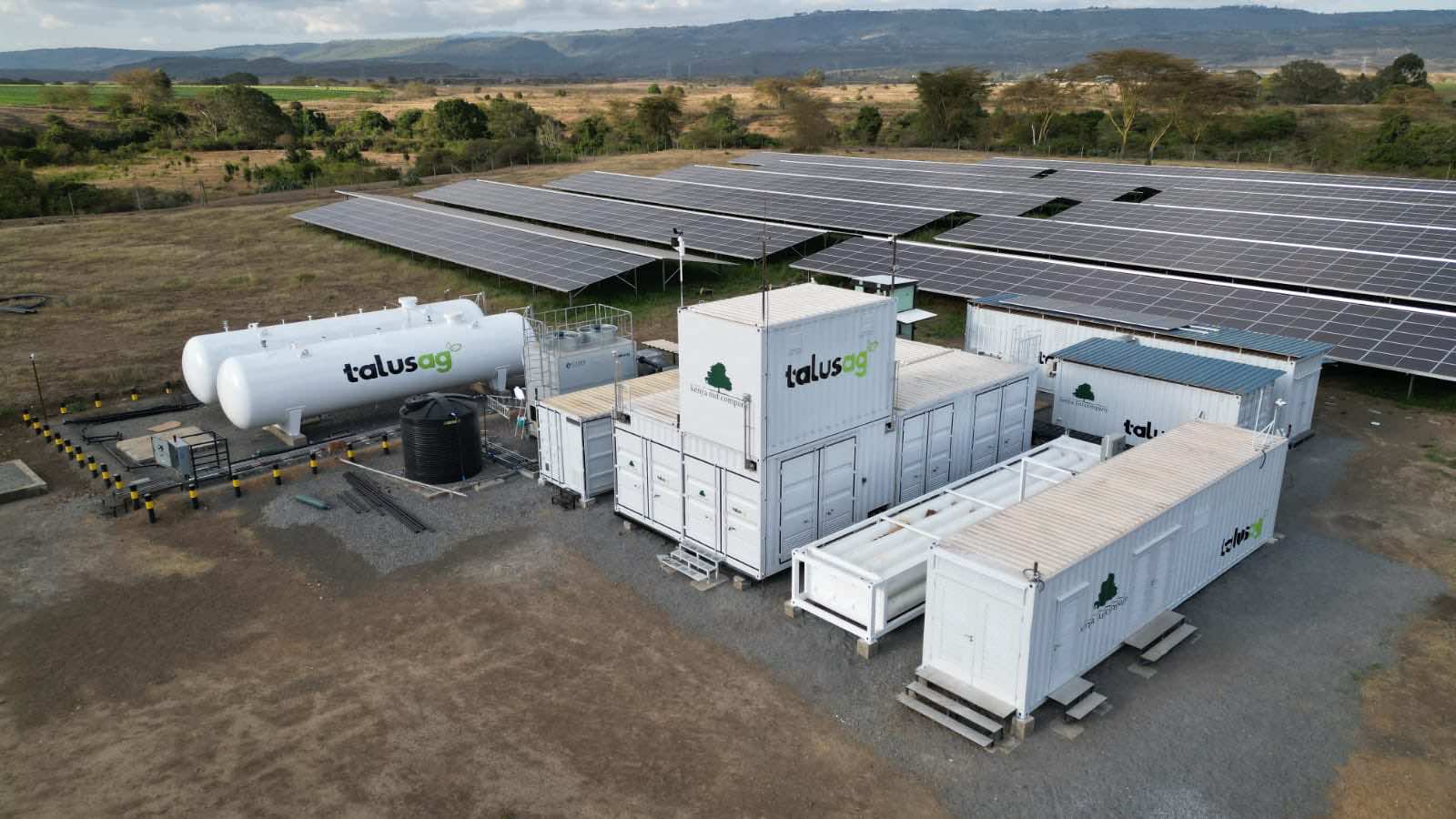A large white building with solar panels AI-generated content may be incorrect.